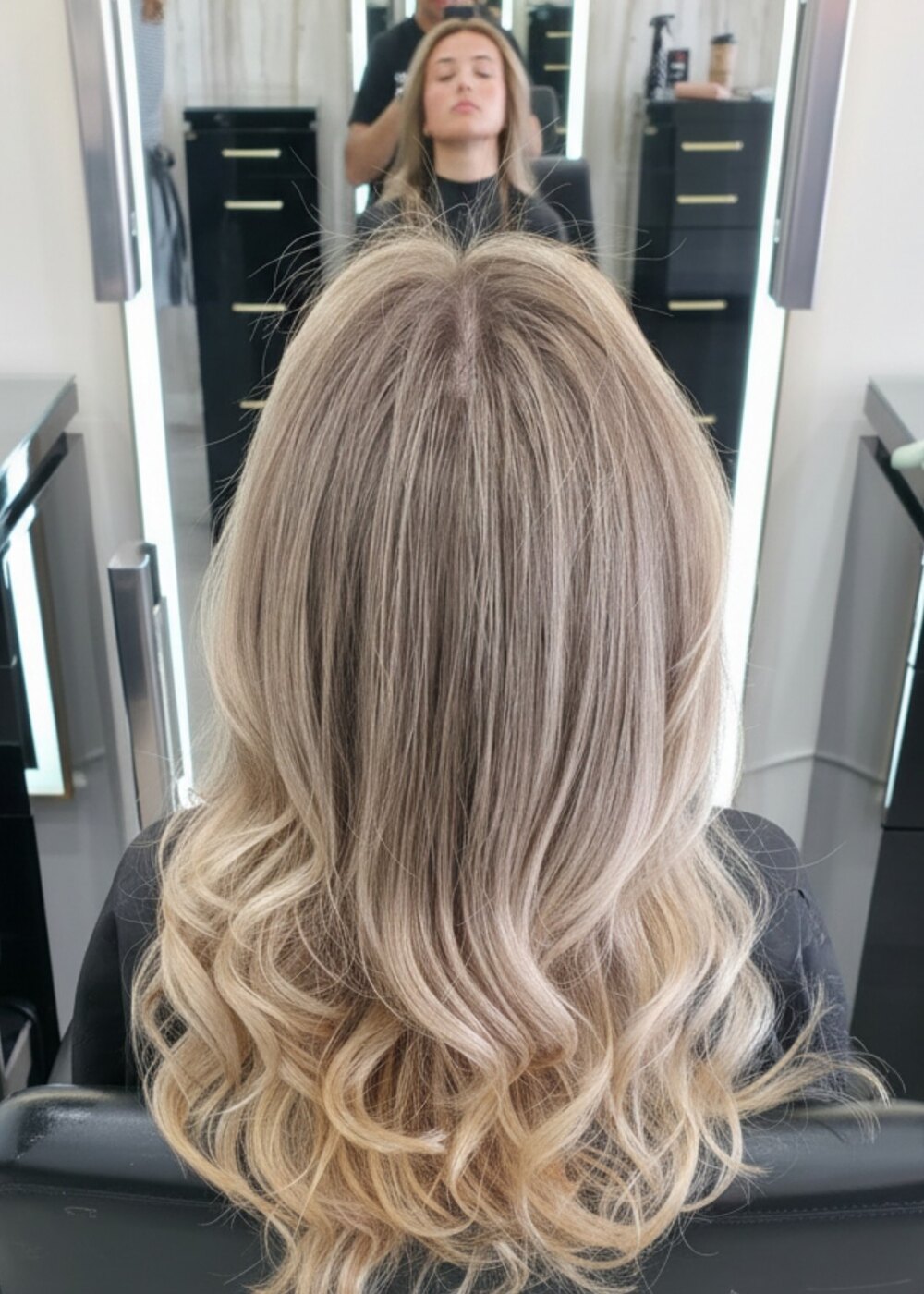 Dimensional cool blonde with seamless shadow root