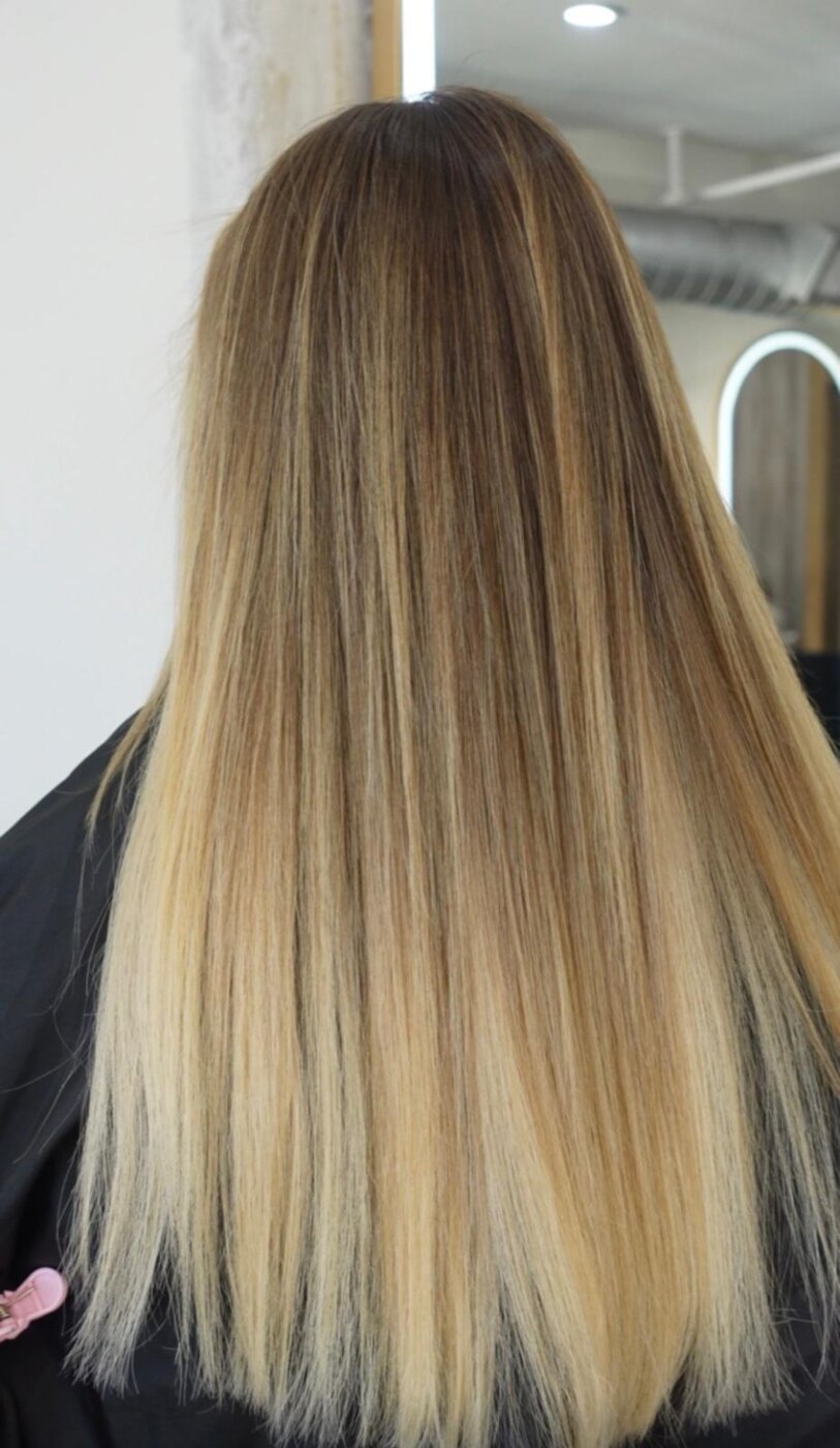 Long lived-in blonde with soft highlights